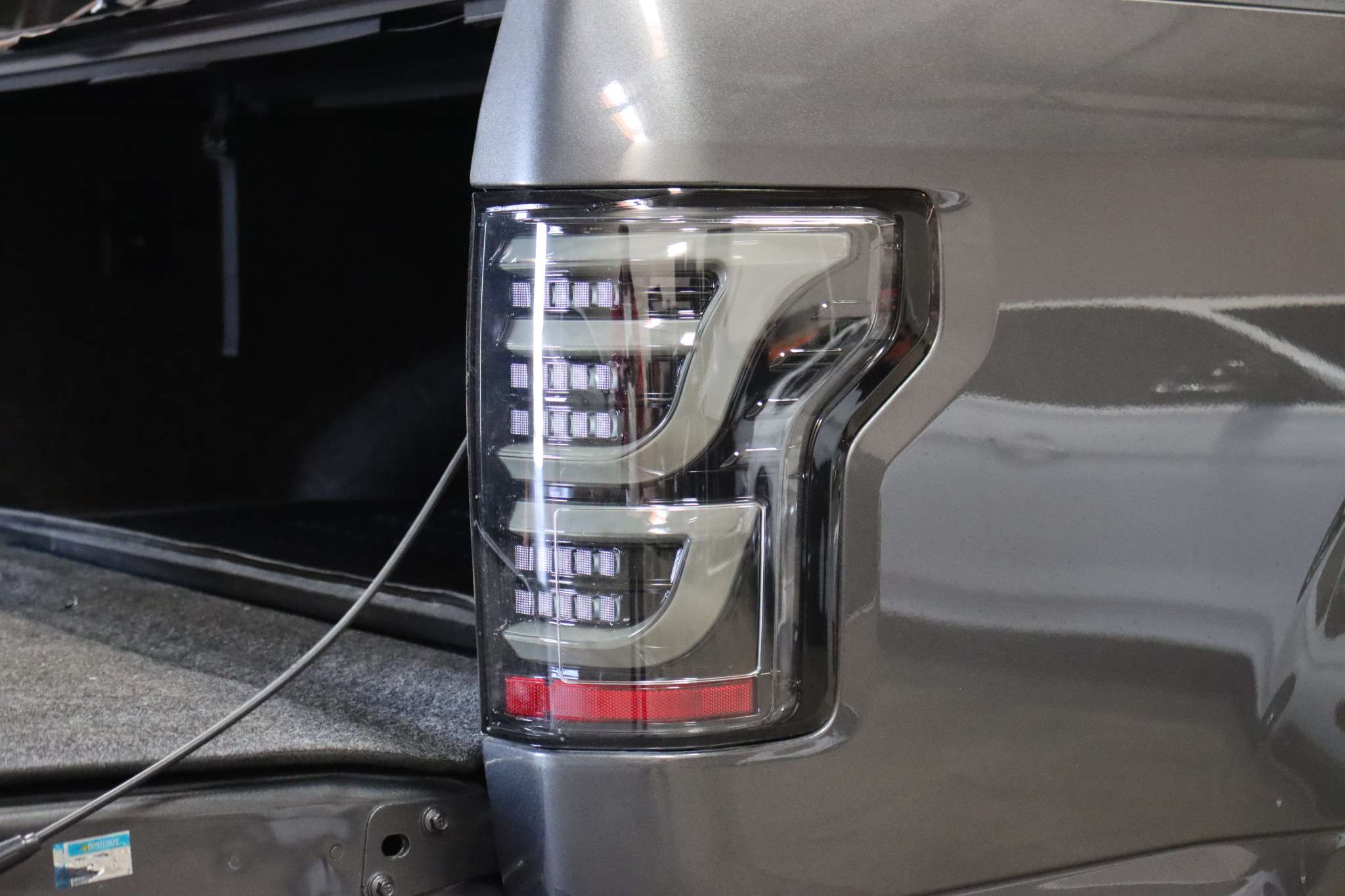 Ford F-150 tail light mounting bolts location 2015 2020
